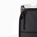 ACME series stick bag displays a string hanger of the side